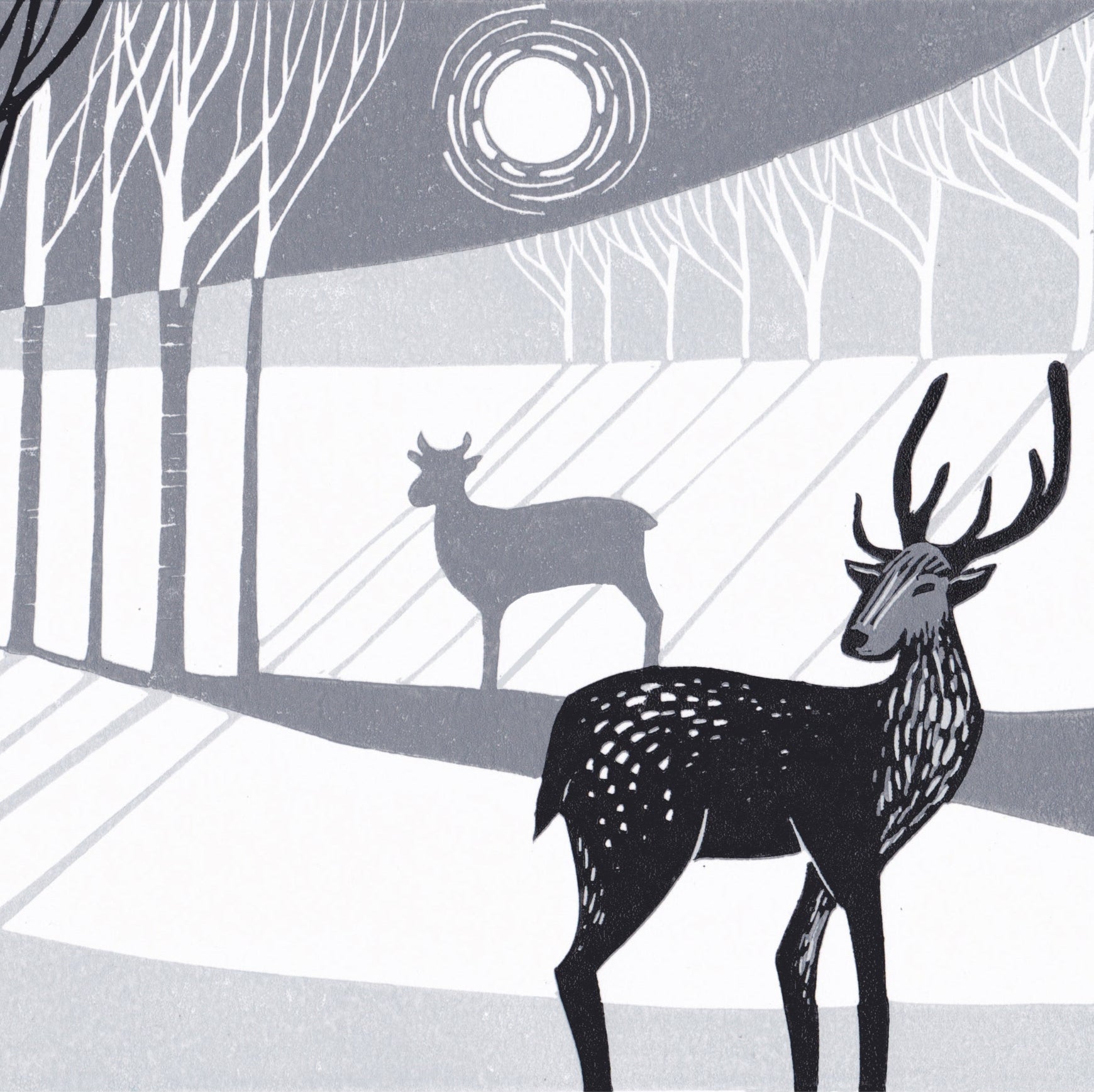 A lino print featuring two stylized deer in a woodland setting with moonlight.