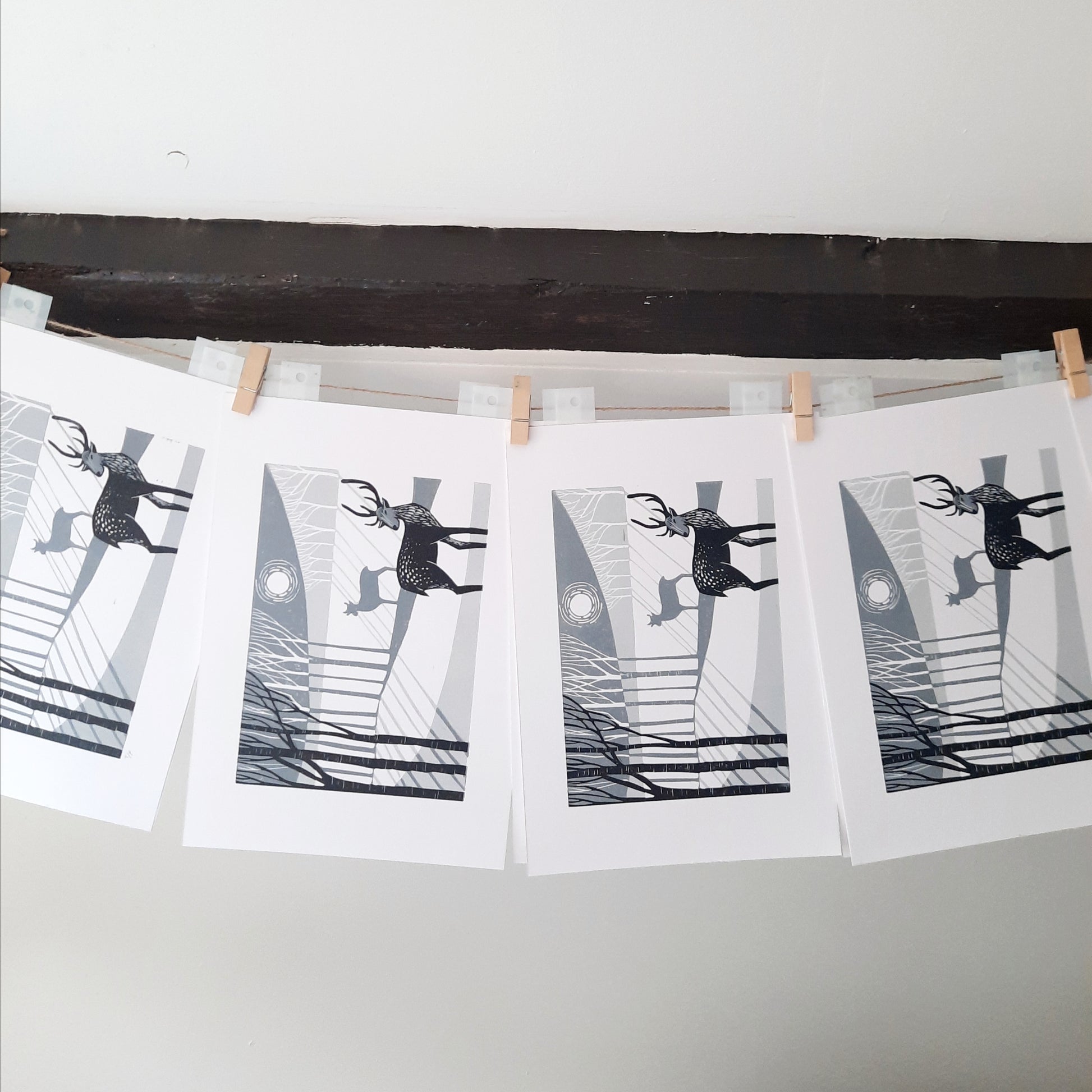 Lino prints hung up to dry