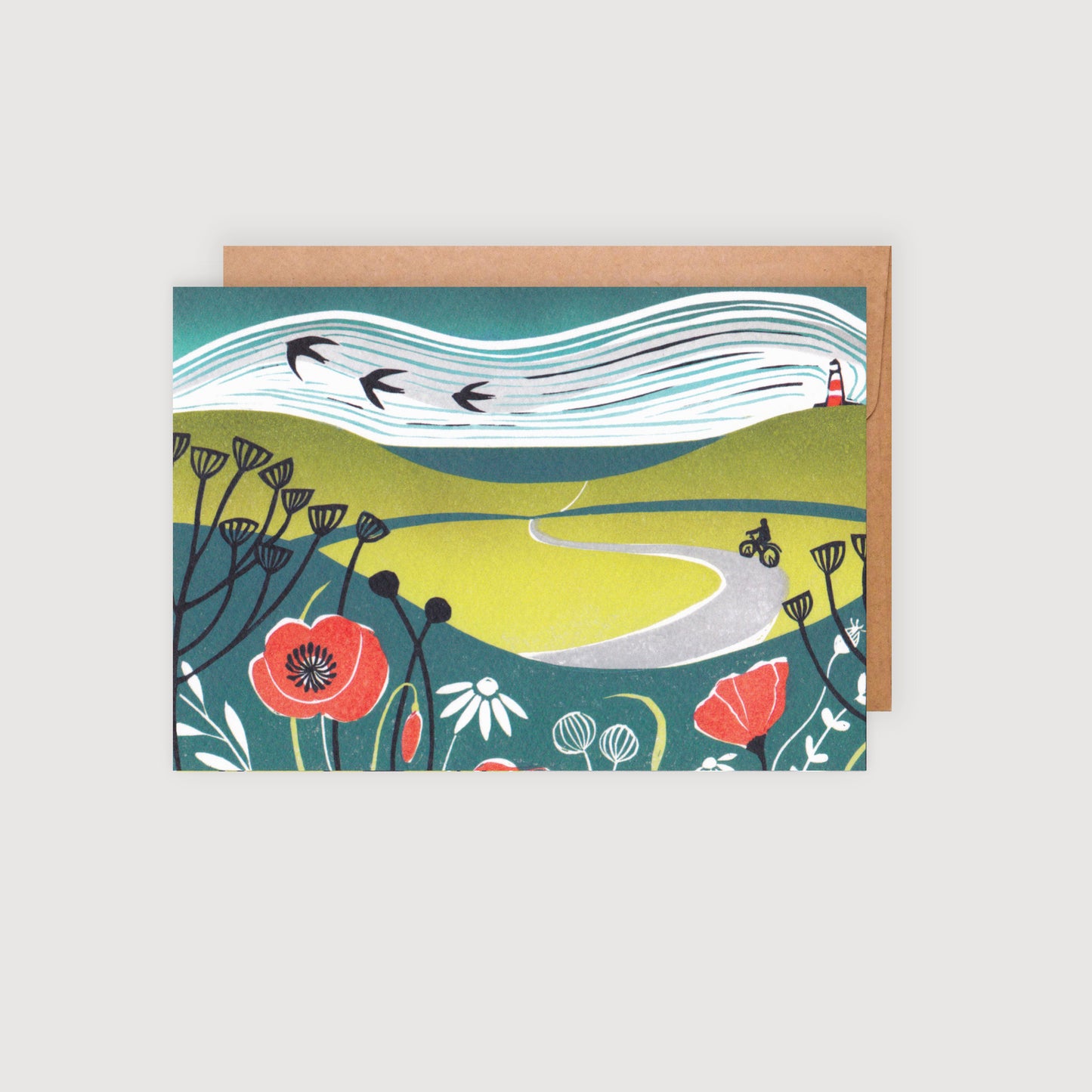 A greetings card with a lino print design of a bike ride towards the coast, featuring poppies and swifts.