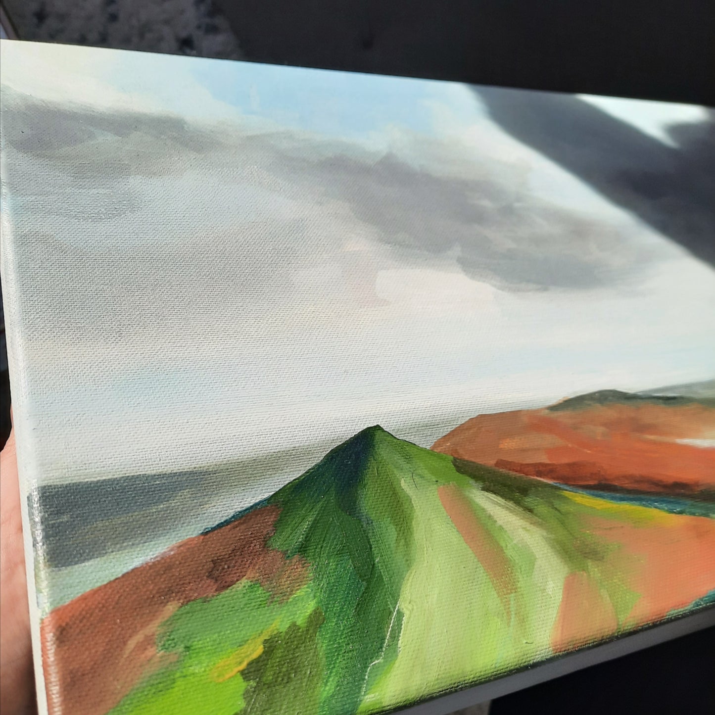 Green hill top depicting the Welsh landscape