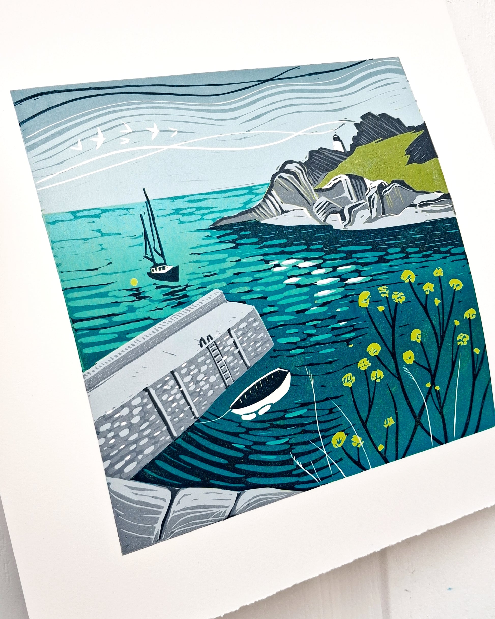 Illustration of a coastal scene with a lighthouse, boat, and rocky landscape.